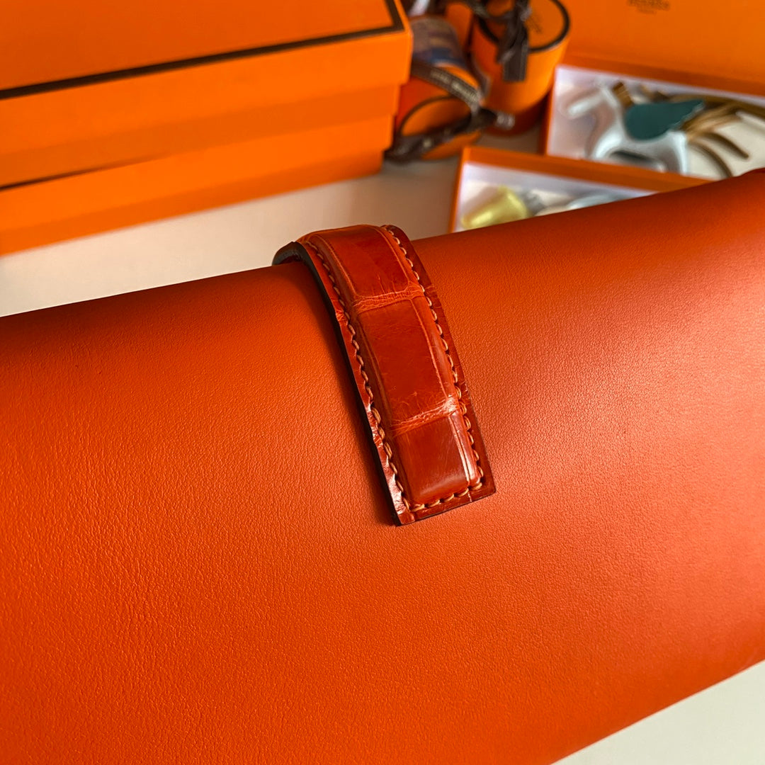 JIGE ELAN 29 CLUTCH IN BRIGHT ORANGE CALFSKIN WITH LIZARD SKIN