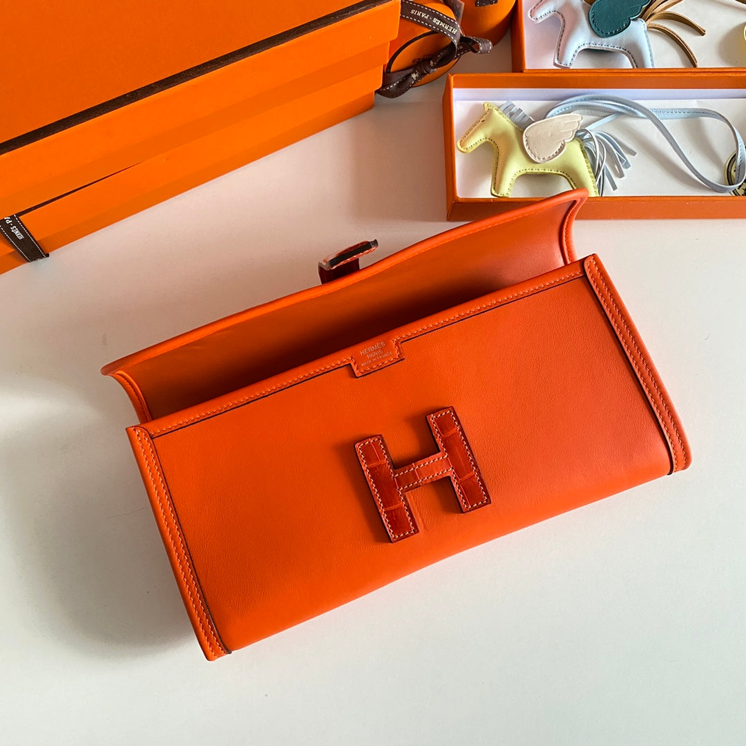 JIGE ELAN 29 CLUTCH IN BRIGHT ORANGE CALFSKIN WITH LIZARD SKIN