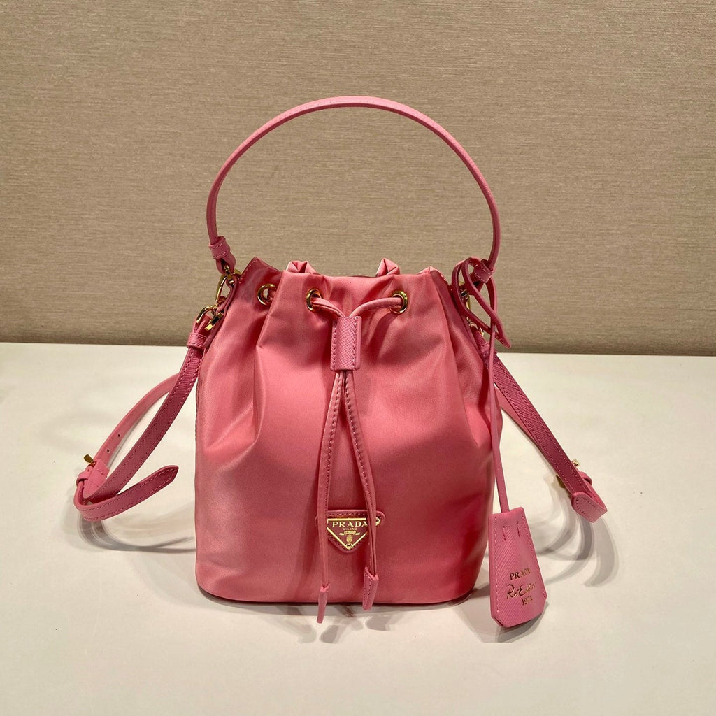 BUCKET BAG 19 IN CANDY PINK RE-NYLON AND SAFFIANO LEATHER HANDLE