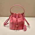 BUCKET BAG 19 IN CANDY PINK RE-NYLON AND SAFFIANO LEATHER HANDLE