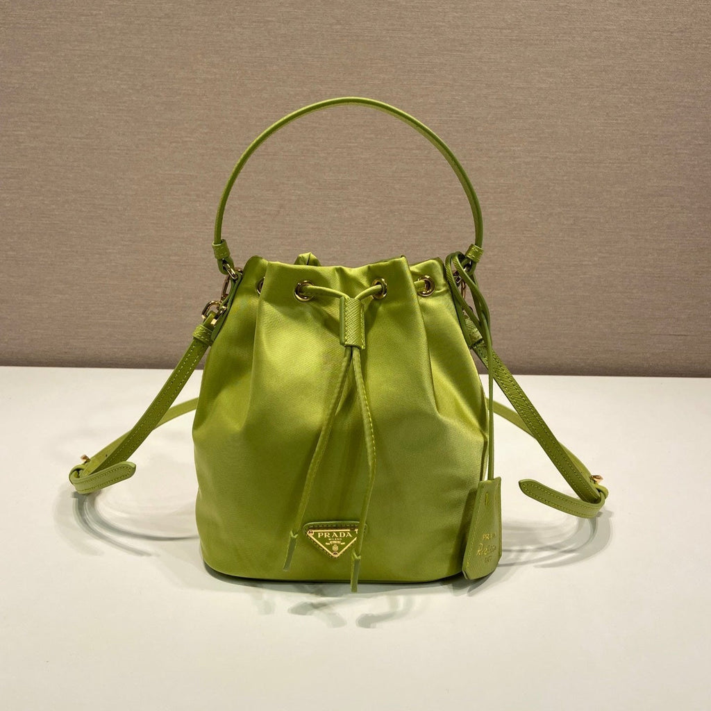 BUCKET BAG 19 IN APPLE GREEN RE-NYLON AND SAFFIANO LEATHER HANDLE