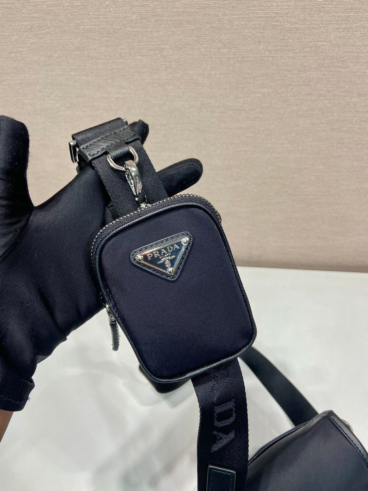 PHONE BAG 19 IN BLACK RE-NYLON AND SAFFIANO LEATHER TRIM
