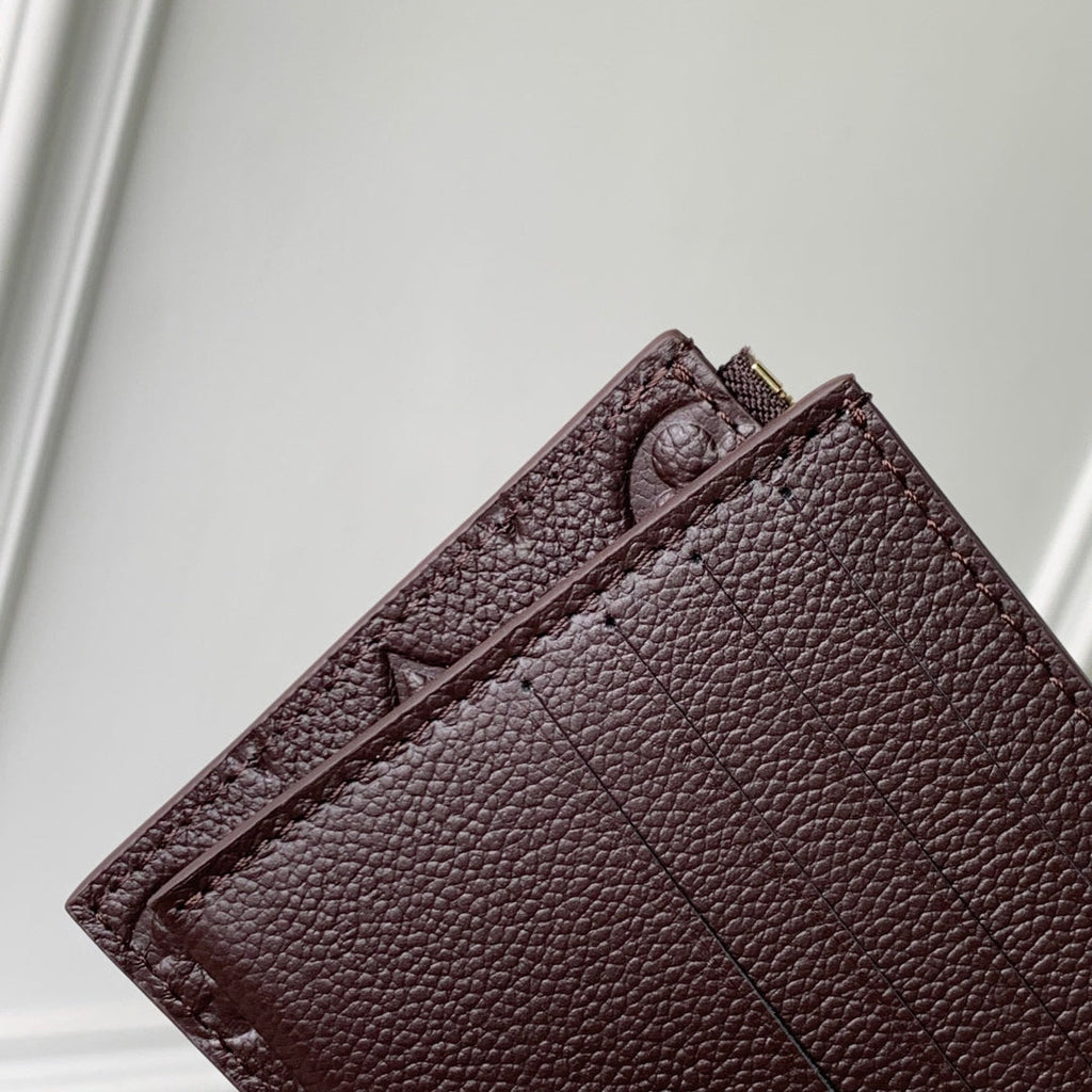 FÉLICIE POCHETTE 21 IN DARK BROWN MONOGRAM EMBOSSED LOGO CALFSKIN