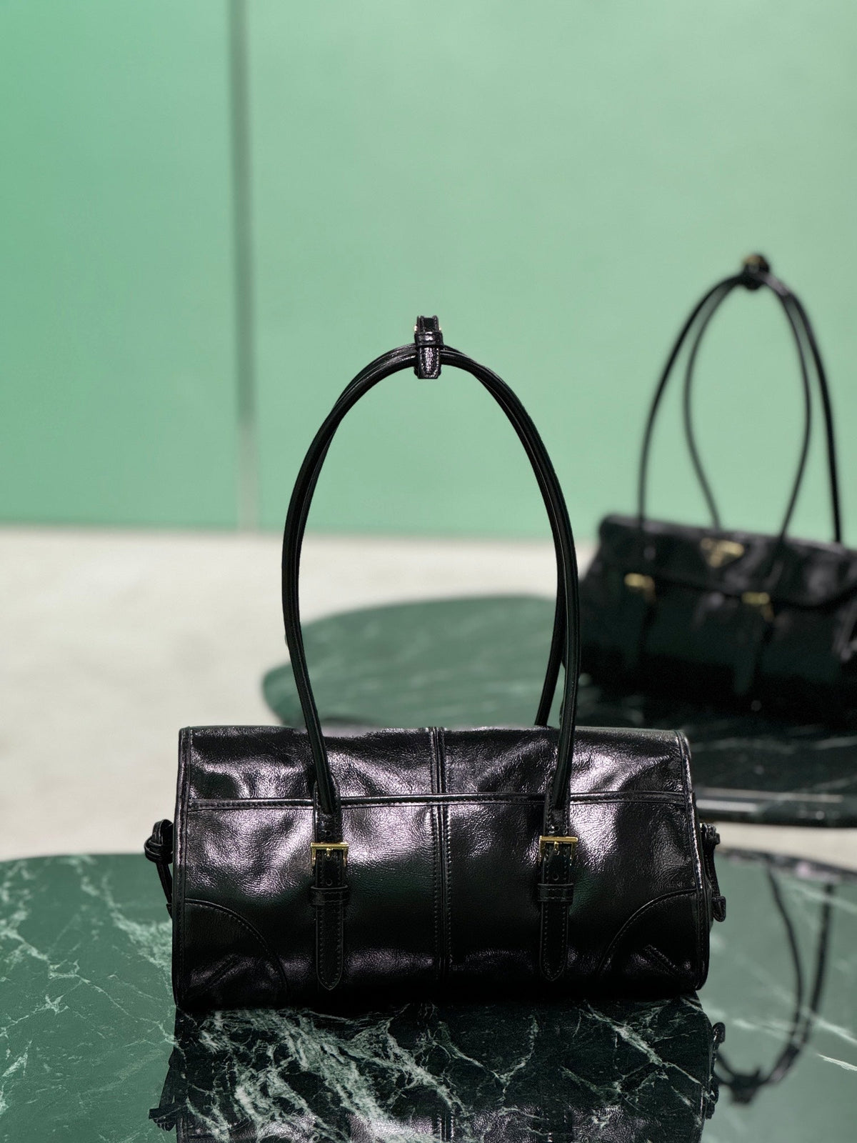 HANDBAG 31 IN BLACK OIL WAX LAMBSKIN