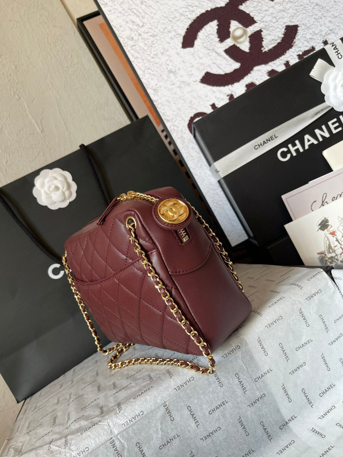 CAMERA BAG 24 IN BUCCANEER RED QUILTED LAMBSKIN DOUBLE C GOLD COIN