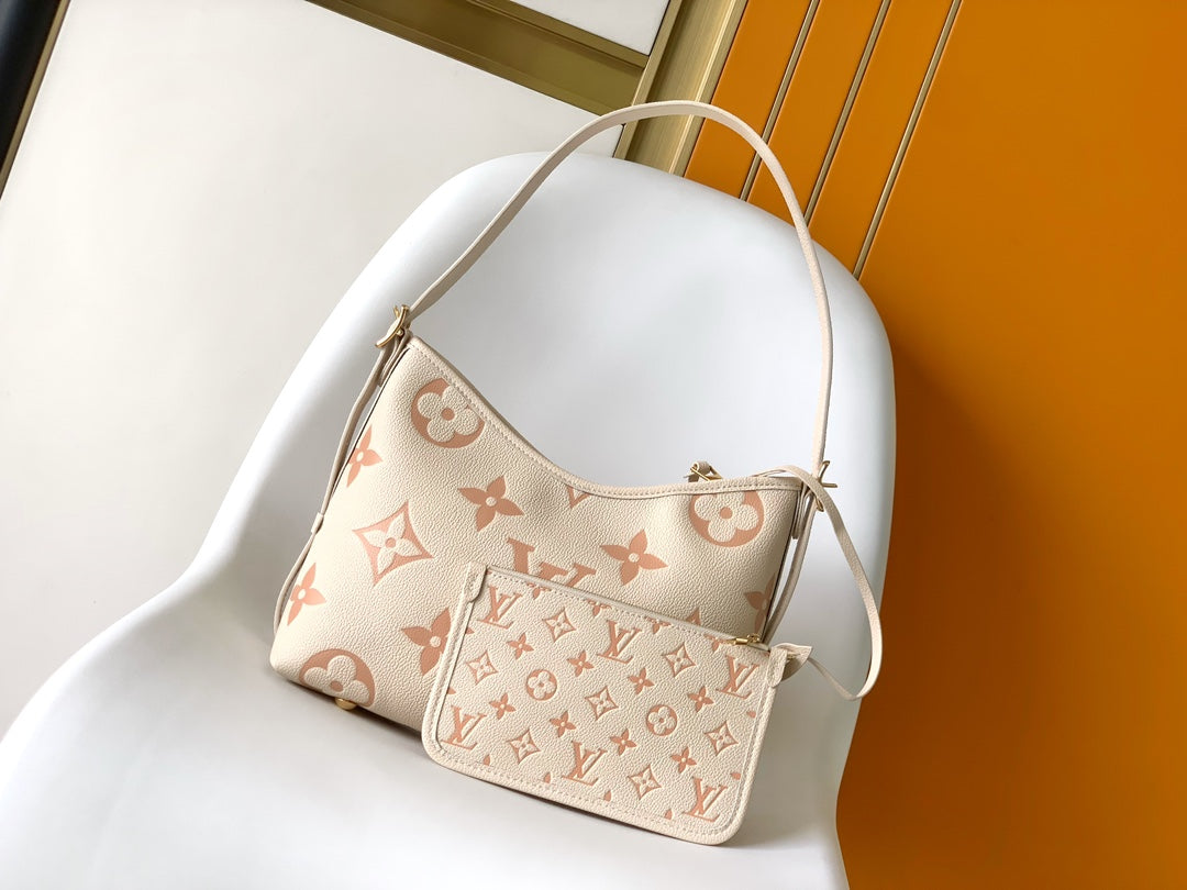 CARRYALL PM 29 BAG IN BEIGE MIX PINK MONOGRAM EMPREINTE LEATHER