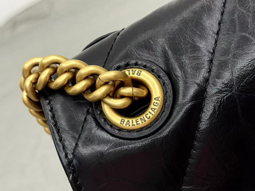 CRUSH SMALL CHAIN BAG 25 IN BLACK QUILTED CRUSHED CALFSKIN GOLD HARDWARE