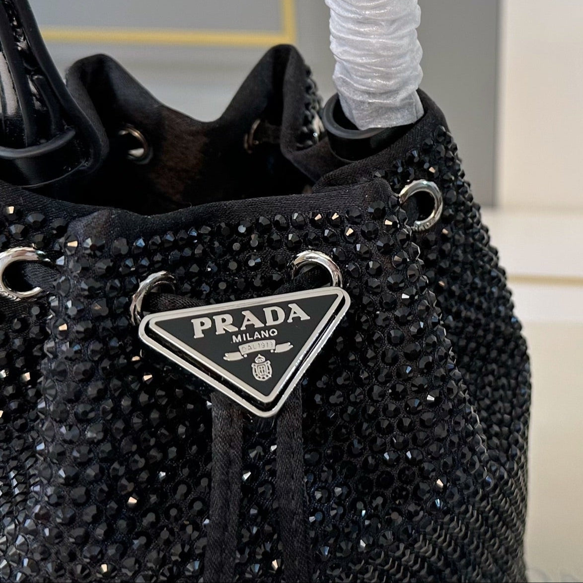 STUDDED BUCKET BAG 19 IN BLACK RE-NYLON MIX CALFSKIN