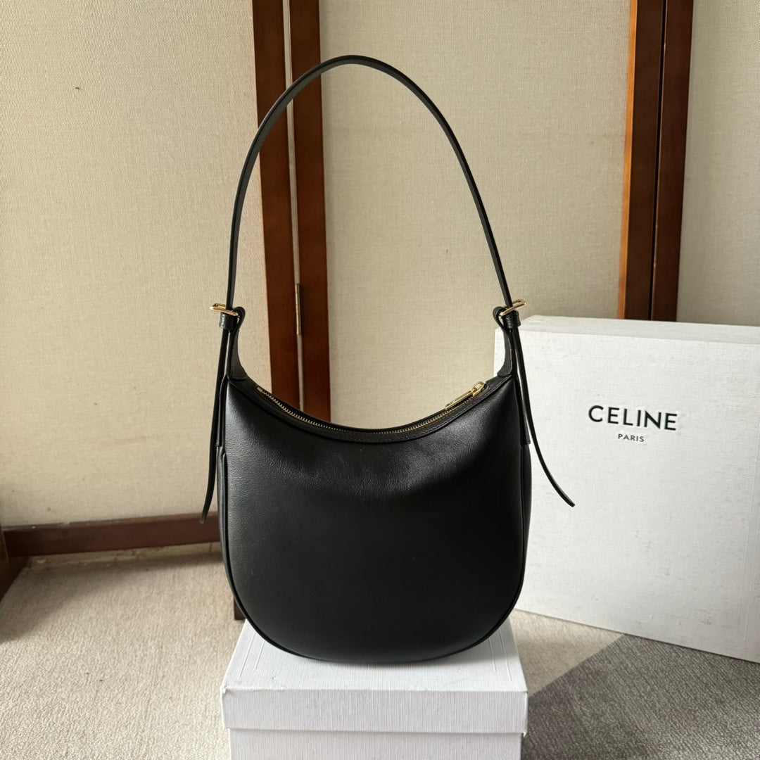 SMALL HELOÏSE BAG CUIR 22 IN BLACK CALFSKIN EMBOSSED LOGO