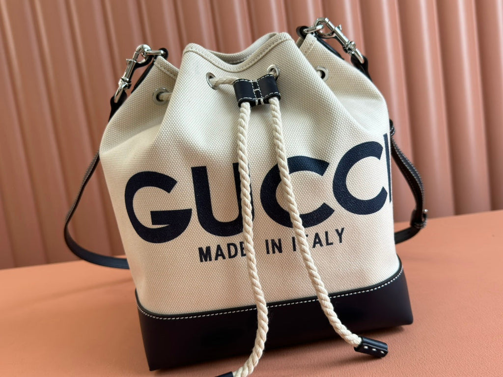 DRAWSTRING SHOULDER BAG LOGO PRINT 31 IN WHITE CANVAS DARK BLUE CALFSKIN