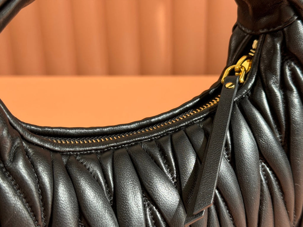 WANDER MATELASSÉ HANDBAG 23 IN BLACK LAMBSKIN